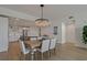 Elegant dining room with hardwood floors and chandelier at 920 N Osceola Ave # 507, Clearwater, FL 33755