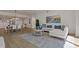 Open concept dining area with a large wooden table and modern chairs at 920 N Osceola Ave # 507, Clearwater, FL 33755