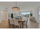 Bright dining room with chandelier and hardwood floors at 920 N Osceola Ave # 507, Clearwater, FL 33755