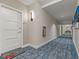 Building hallway with carpet and nautical decor at 920 N Osceola Ave # 507, Clearwater, FL 33755