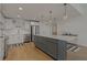 Modern kitchen with stainless steel appliances and an island at 920 N Osceola Ave # 507, Clearwater, FL 33755