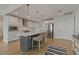 Modern kitchen with island, stainless steel appliances, and white cabinetry at 920 N Osceola Ave # 507, Clearwater, FL 33755