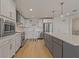 Modern kitchen with stainless steel appliances and an island at 920 N Osceola Ave # 507, Clearwater, FL 33755