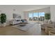 Spacious living room with water views and ample natural light at 920 N Osceola Ave # 507, Clearwater, FL 33755
