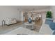 Spacious living area showcasing an open floor plan with kitchen view at 920 N Osceola Ave # 507, Clearwater, FL 33755