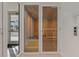 Relaxing sauna with wooden interior and glass doors at 920 N Osceola Ave # 507, Clearwater, FL 33755