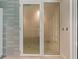 Private steam room with glass doors and modern fixtures at 920 N Osceola Ave # 507, Clearwater, FL 33755