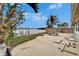 Backyard patio with water views and wooden bench at 1022 Canal St, Ruskin, FL 33570