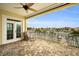 Relaxing balcony overlooking the water; features a comfortable chair and ottoman at 11325 5Th E St, Treasure Island, FL 33706