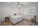 Bright bedroom with a king-size bed and wood floors at 11325 5Th E St, Treasure Island, FL 33706
