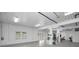 Bright and spacious garage with high ceilings and ample storage at 11325 5Th E St, Treasure Island, FL 33706