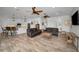 Modern kitchen with white cabinets, granite countertops, and island seating at 11325 5Th E St, Treasure Island, FL 33706