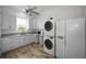 Laundry room with washer, dryer, and ample counter space at 11325 5Th E St, Treasure Island, FL 33706