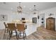 Spacious living area with hardwood floors and comfortable leather seating at 11325 5Th E St, Treasure Island, FL 33706