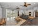 Spacious living room with leather sofas and water views at 11325 5Th E St, Treasure Island, FL 33706
