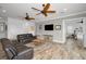Bright living area with hardwood floors and comfortable seating at 11325 5Th E St, Treasure Island, FL 33706
