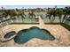 Inviting freeform pool with spa and large patio area at 11325 5Th E St, Treasure Island, FL 33706
