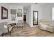 Relaxing sitting area with two armchairs and a large mirror at 11325 5Th E St, Treasure Island, FL 33706
