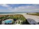 Aerial view of resort pool, beach, and ocean at 1180 Gulf Blvd # 1603, Clearwater Beach, FL 33767