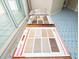 Various flooring samples displayed on a table at 1180 Gulf Blvd # 1603, Clearwater Beach, FL 33767