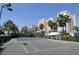 Well-maintained tennis court with seating at 1180 Gulf Blvd # 1603, Clearwater Beach, FL 33767