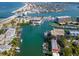 Aerial view of waterfront property with private boat docks and resort style amenities at 12482 Capri N Cir # 4, Treasure Island, FL 33706
