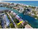 Aerial view of waterfront property with boat slips and canal access at 12482 Capri N Cir # 4, Treasure Island, FL 33706