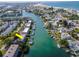 Aerial view of waterfront property with boat slips and resort amenities at 12482 Capri N Cir # 4, Treasure Island, FL 33706