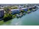 Aerial view of waterfront property with private boat slips at 12482 Capri N Cir # 4, Treasure Island, FL 33706