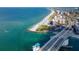 Aerial view of bridge, beach, and ocean at 12482 Capri N Cir # 4, Treasure Island, FL 33706