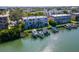 Aerial view of waterfront property with private boat slips at 12482 Capri N Cir # 4, Treasure Island, FL 33706