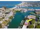 Aerial view of canal front property with private boat docks and community amenities at 12482 Capri N Cir # 4, Treasure Island, FL 33706