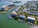 High-angle view of condo complex near marina, offering water access and boat storage at 12482 Capri N Cir # 4, Treasure Island, FL 33706