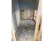 Bathroom under renovation with exposed framing and plumbing at 12482 Capri N Cir # 4, Treasure Island, FL 33706