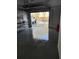 Attached garage with epoxy flooring and access to outside at 12482 Capri N Cir # 4, Treasure Island, FL 33706