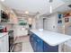 Updated kitchen with stainless steel appliances and a large island at 12482 Capri N Cir # 4, Treasure Island, FL 33706