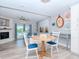 Bright living room with water views and comfortable seating at 12482 Capri N Cir # 4, Treasure Island, FL 33706
