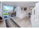 Living room with water view, built in bunk beds, and sliding glass doors at 12482 Capri N Cir # 4, Treasure Island, FL 33706