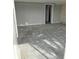 Empty spare bedroom, ready for your personal touch and design at 12482 Capri N Cir # 4, Treasure Island, FL 33706