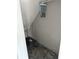 Small storage closet with simple shelving and painted walls at 12482 Capri N Cir # 4, Treasure Island, FL 33706