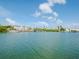 Scenic waterfront view with boats and a bridge in the distance at 12482 Capri N Cir # 4, Treasure Island, FL 33706
