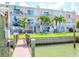 Backyard oasis with private dock, lush landscaping, and water access at 12482 Capri N Cir # 4, Treasure Island, FL 33706