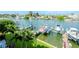 Scenic waterfront view with boats docked at private piers at 12482 Capri N Cir # 4, Treasure Island, FL 33706