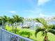 View from balcony of palm trees and waterway at 12482 Capri N Cir # 4, Treasure Island, FL 33706