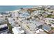 Aerial view showcasing a beach neighborhood near the ocean at 126 90Th Ave, Treasure Island, FL 33706