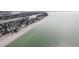 Aerial view of beachfront homes and coastline at 126 90Th Ave, Treasure Island, FL 33706