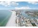 Beachfront property aerial view, showing homes and coastline at 126 90Th Ave, Treasure Island, FL 33706
