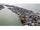 Aerial view of neighborhood near waterfront at 126 90Th Ave, Treasure Island, FL 33706