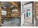 Rustic bar area with wood and metal accents, and a small sink at 126 90Th Ave, Treasure Island, FL 33706
