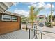 Elevated deck with railing, offering street views at 126 90Th Ave, Treasure Island, FL 33706